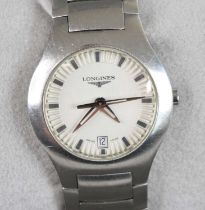 A lady's Longines steel cased quartz bracelet watch, circa 2002, having a signed white dial with