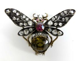 A late Victorian yellow and white metal multi-stone winged insect brooch, the abdomen comprising a