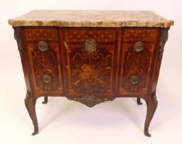 A French mahogany rosewood and satinwood inlaid transitional style commode, early 20th century, gilt