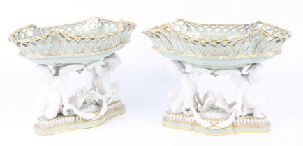 A pair of Minton porcelain celadon and white glazed porcelain table baskets, circa 1870, the gilt