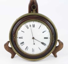 An early 19th century sedan clock, having a white enamel convex dial with Roman numerals within an