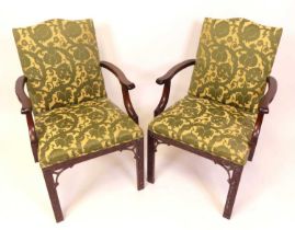 A set of ten contemporary mahogany and green floral fabric upholstered dining chairs, in the