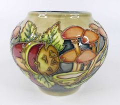 A contemporary Moorcroft Past Times pattern vase, designed by J Hancock, of shouldered squat