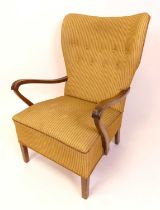 A 1950s Danish beech framed and striped buttonback upholstered open armchair, the shaped moulded