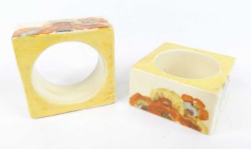 A pair of 1930s Clarice Cliff Rhodanthe pattern pottery square napkin rings, each 5 x 5cm Each