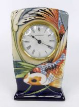 A contemporary Moorcroft Quiet Waters pattern pottery mantel clock, designed by Philip Gibson,