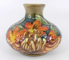 A contemporary Moorcroft Flames of the Forest pattern pottery squat vase, designed by Philip Gibson,