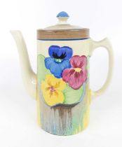 A 1930s Clarice Cliff Delicia Pansies pattern pottery coffee pot and cover, of cylindrical