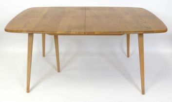 An Ercol blond elm 'Grand Plank' Windsor extending dining table, having rounded D-ends, pull-out