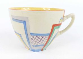 A 1930s Clarice Cliff Tennis pattern pottery teacup, of slightly lobed tapering form, bright