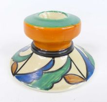 A 1930s Clarice Cliff Double V pattern pottery squat candlestick, typically bright colour decorated,