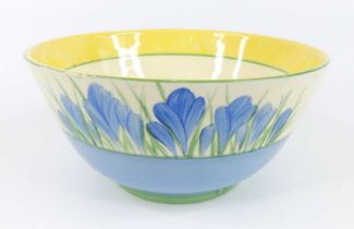 A 1930s Clarice Cliff Blue Crocus pattern small bowl, typically bright colour decorated, with