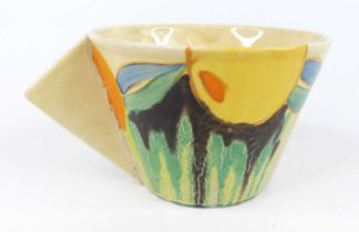 A 1930s Clarice Cliff Delicia Citrus pattern pottery conical teacup, with angular block handle,