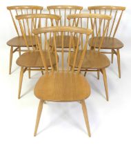 A set of six Ercol blond elm stickback dining chairs, model No. 449, each with slightly dished seats
