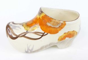 A 1930s Clarice Cliff Rhodanthe pattern pottery large clog, typically bright colour decorated, black