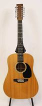 A circa 1980 C.F. Martin & Co. twelve-string acoustic guitar, model No. D 12-20, serial No.