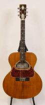 A 1976 Anthony Zemaitis six-string acoustic guitar, commissioned by Steve Harley, having a