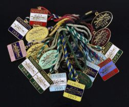 A collection of mainly base metal and enamelled members badges for Newmarket Racecourse dated from