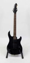 A Peavey AT-200 electric guitar, serial no. BNBCHK311354, having a black headstock and body, twin