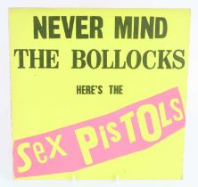 A collection of assorted 12" vinyl, to include: The Sex Pistols - Never Mind The Bollocks; "Live