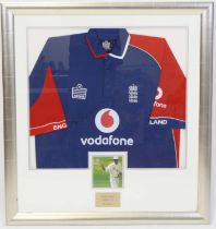 A replica England International Cricket shirt, sponsor Vodafone, signed in black ink Michael