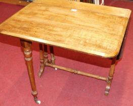 A Victorian figured walnut round cornered Sutherland table