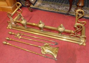 A late Victorian brass fire fender, together with sundry fire tools to include; shovel, poker and