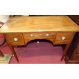 A 19th century mahogany kneehole three-drawer low boy, on square tapering supports to castors, width