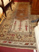 A Turkish woollen Bodrum cream ground rug, 236 x 146cm