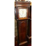 A George III oak longcase clock, having an 11" indistinctly signed painted square dial, with rolling