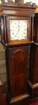 A George III oak longcase clock, having an 11" indistinctly signed painted square dial, with rolling