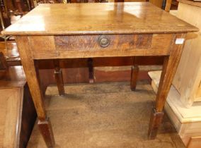 A rustic oak planked top single drawer side table, width 71cm