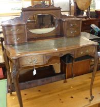 A circa 1900 mahogany lady's bureau de dame, the raised superstructure with inset mirror plate and
