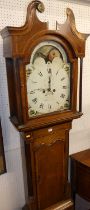 F. Arkinstall of Market Drayton - an early 19th century oak and mahogany crossbanded longcase clock,