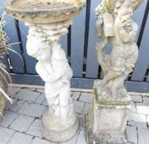 A reconstituted stone bird bath, h.91.5cm; together with a reconstituted stone garden statue of