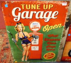 A printed tin advertising sign for Tune Up Garage, 70 x 50cm