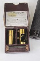 A vintage brass student's microscope; together with a Britex Featherlite 20x magnification telescope