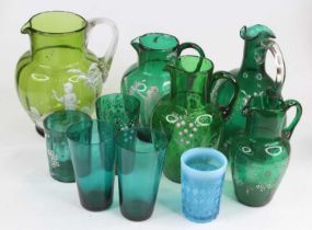 A collection of 19th century and later green glassware, to include Mary Gregory style enamel