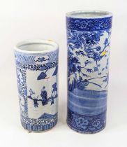 A Chinese blue and white stickstand, underglaze decorated with birds amongst trees, h.60cm; together