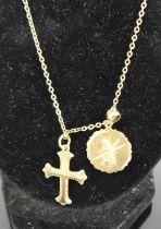 A 9ct gold necklace, with 9ct gold cross pendant, and 14ct gold round pendant, gross weight 7.8g