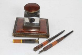 A simulated tortoiseshell and brass inkwell; together with a fountain pen and seal