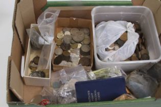 A collection of mixed coinage, medallions and loose stamps
