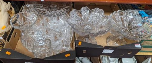 A collection of glassware to include a cut glass decanter and stopper, brandy balloons, tumblers,