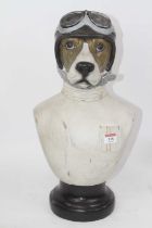 A novelty composite bust of a dog dressed as a racing driver, h.50cm