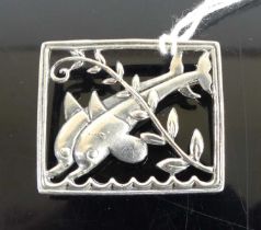 An Art Deco style sterling silver brooch, fashioned in dolphins within a square frame, w.33mm