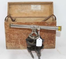 An early 20th century American theodolite, the tube with rack and pinion action and bubble level,