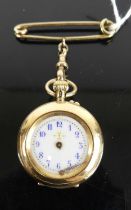 A continental lady's 14ct gold fob watch, having unsigned white enamel dial (lacking hands),