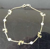 A 9ct gold and cultured pearl set child's bracelet, 2.1g, 20cm