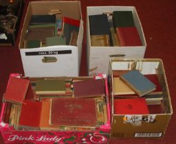 Four boxes of vintage books, to include Penguin