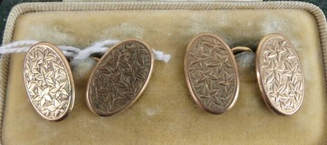 A cased pair of 9ct gold engraved oval cufflinks, 10g